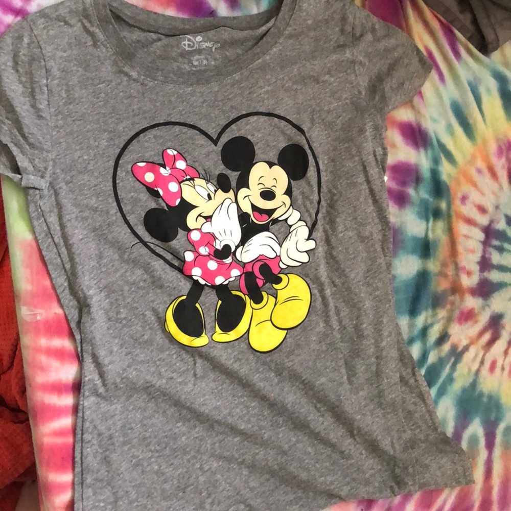 A brand new juniors Disney tee shirt never worn